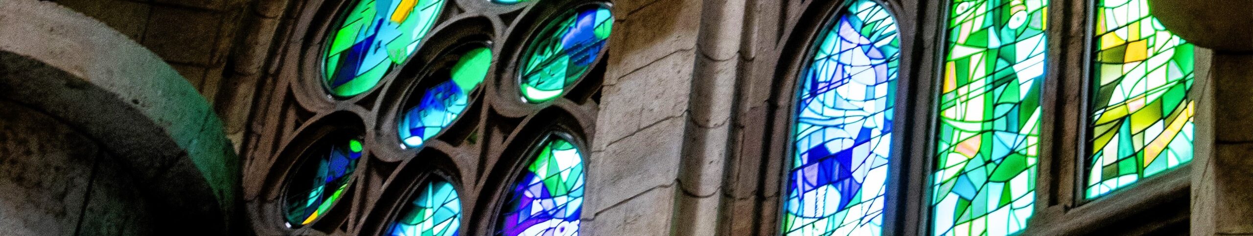 green stained glass of a church 652 px